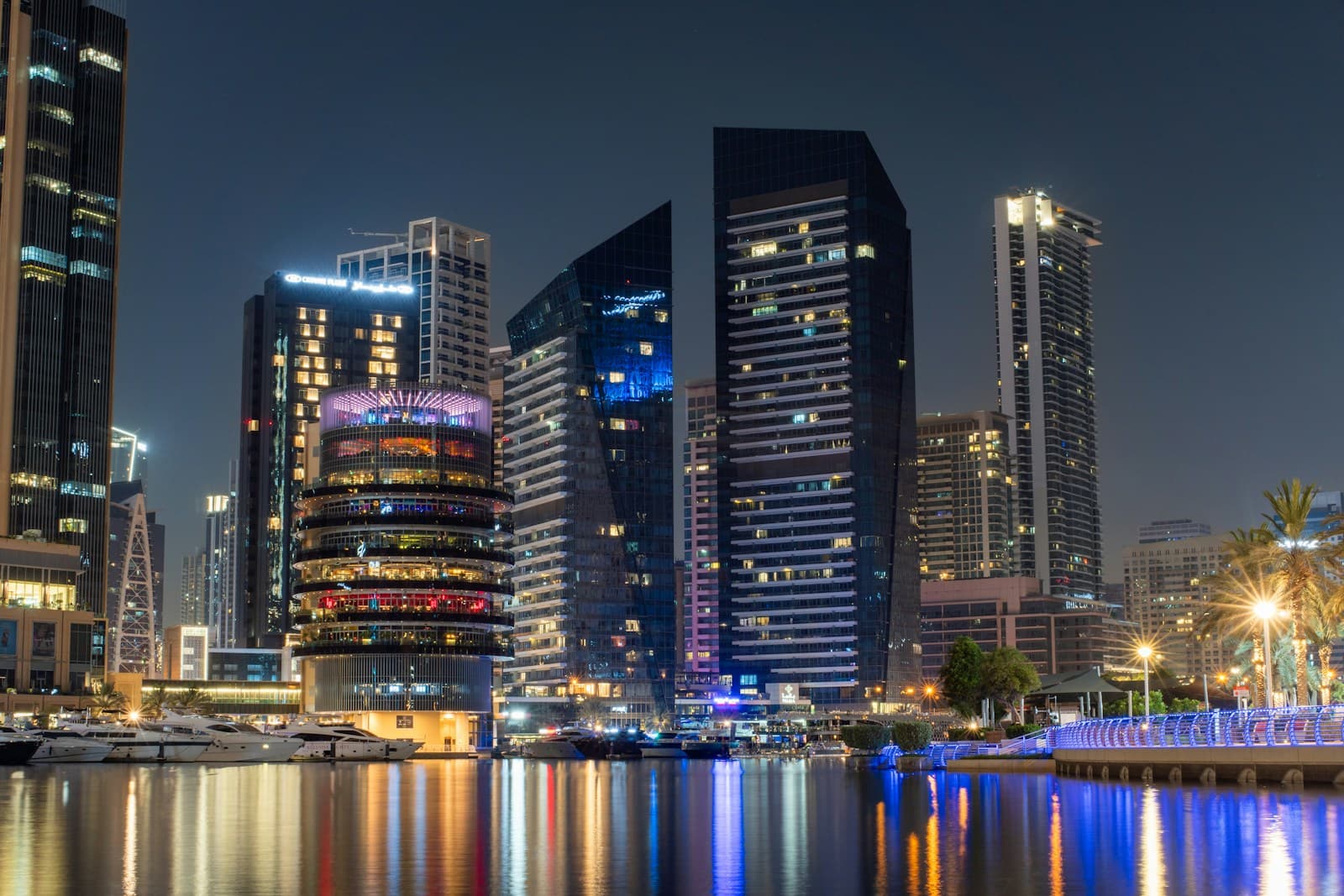 Dubai Marina towers at night, illuminated skyline along the waterfront